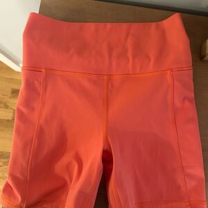 Vuori Orange Bike Shorts with Stretchy Fabric